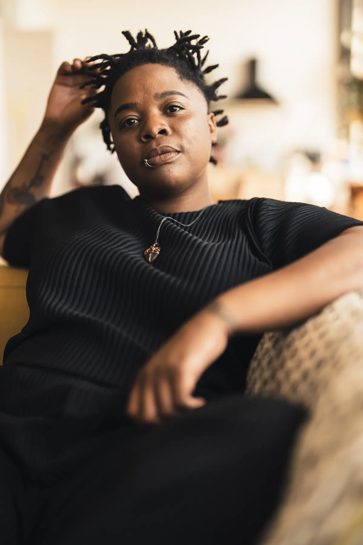 Portrait of Corynne Elliott seated in a chair